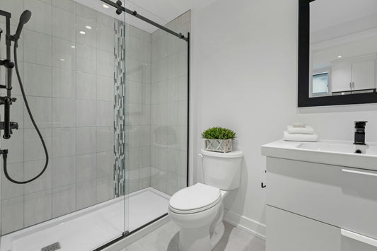 Clean, clear glass shower screen in a modern bathroom protected by GlassProtect